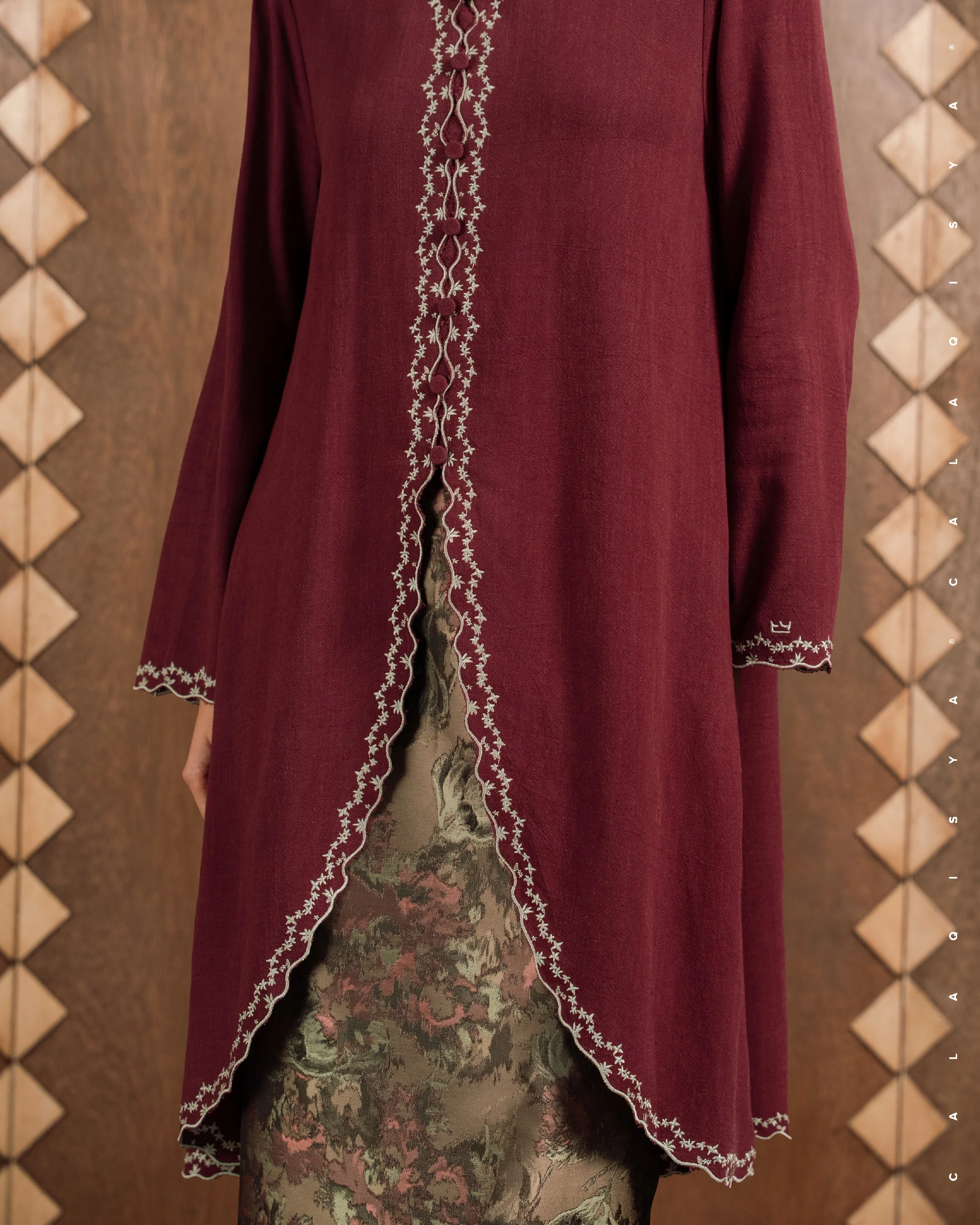 ANNA DALIA IN MAROON BANNER